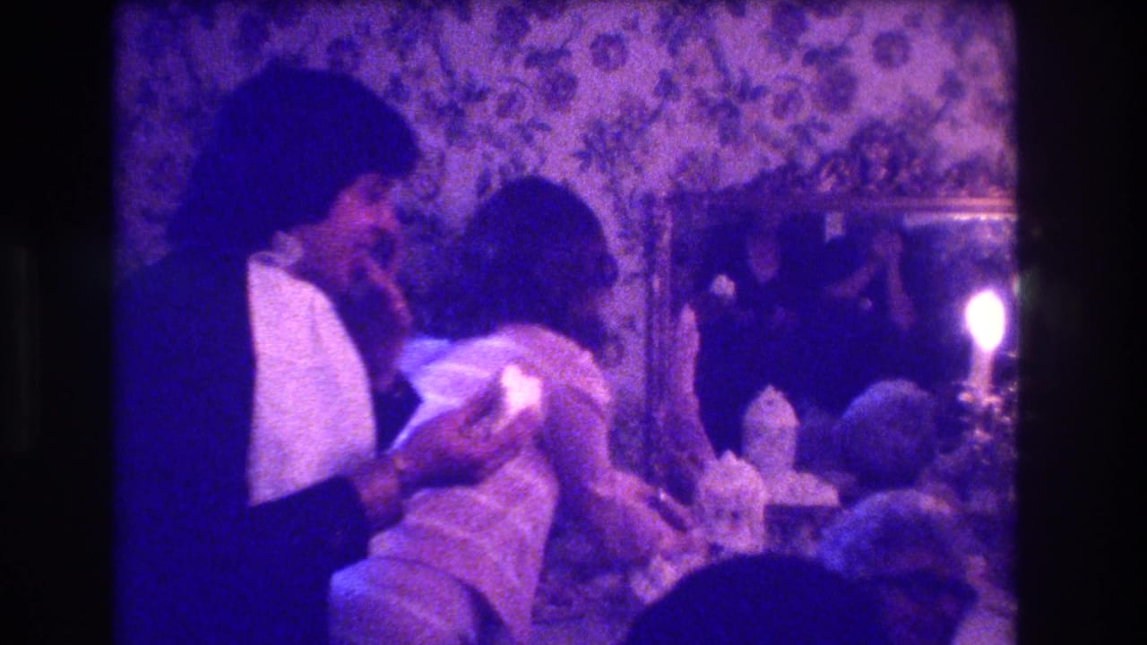 The Medford wedding-party footage shows a man in formalwear interacting closely with a seated woman in a light dress.