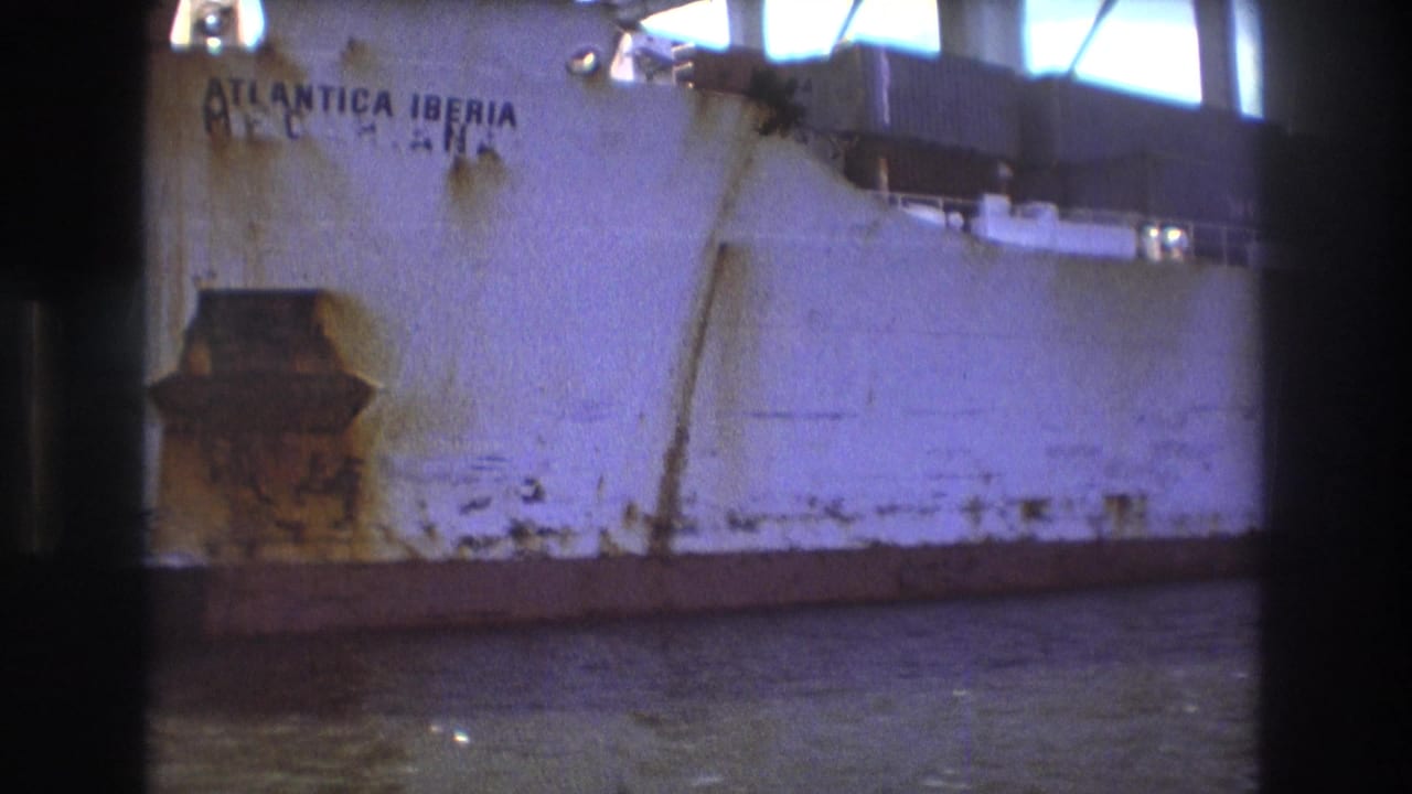 Cargo ship hull with the name ATLANTICA IBERIA visible above the waterline.