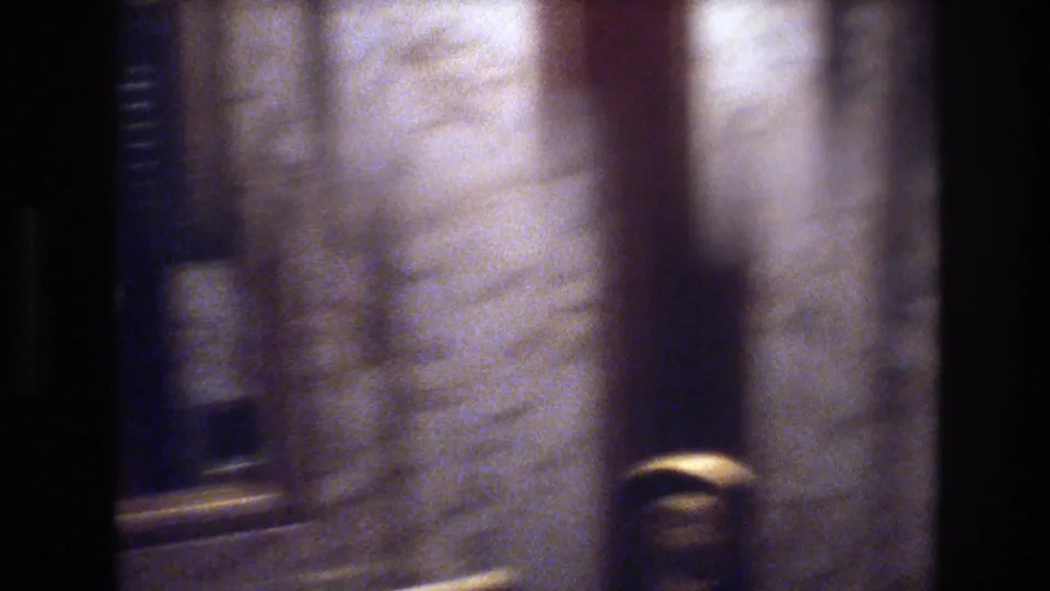 8mm close-up of marble-clad columns with gold hardware in a Las Vegas casino hotel lobby, circa 1977.