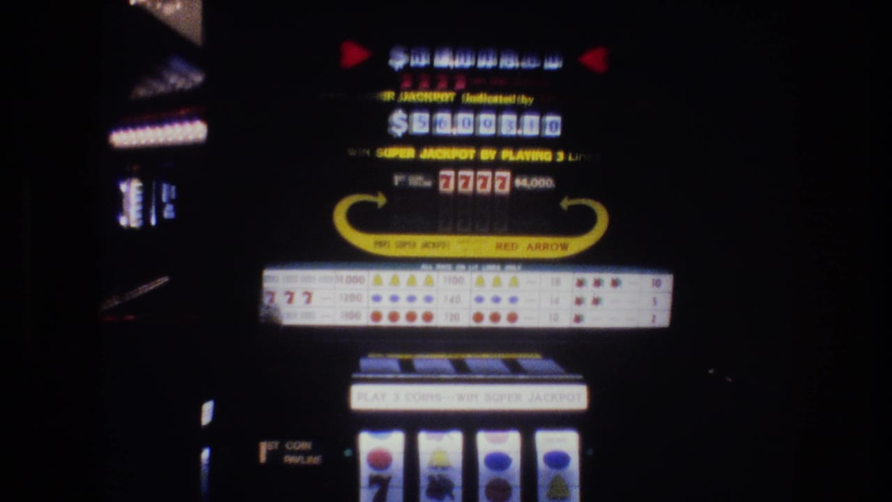 Slot machine with jackpot dollar display, "SUPER JACKPOT" indicator, red triangular arrows, "RED ARROW" branded arch, payout table, and reel panel against a dark background.