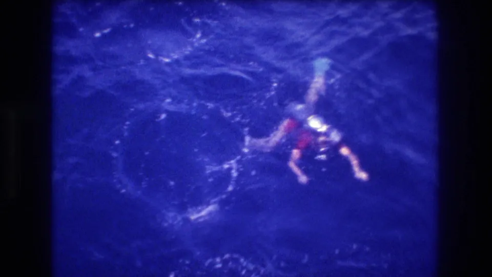The final frame shows a swimmer in red trunks floating or treading water in the dark blue ocean, with a bright splash or reflection nearby in the supplied Acapulco snorkeling clip.
