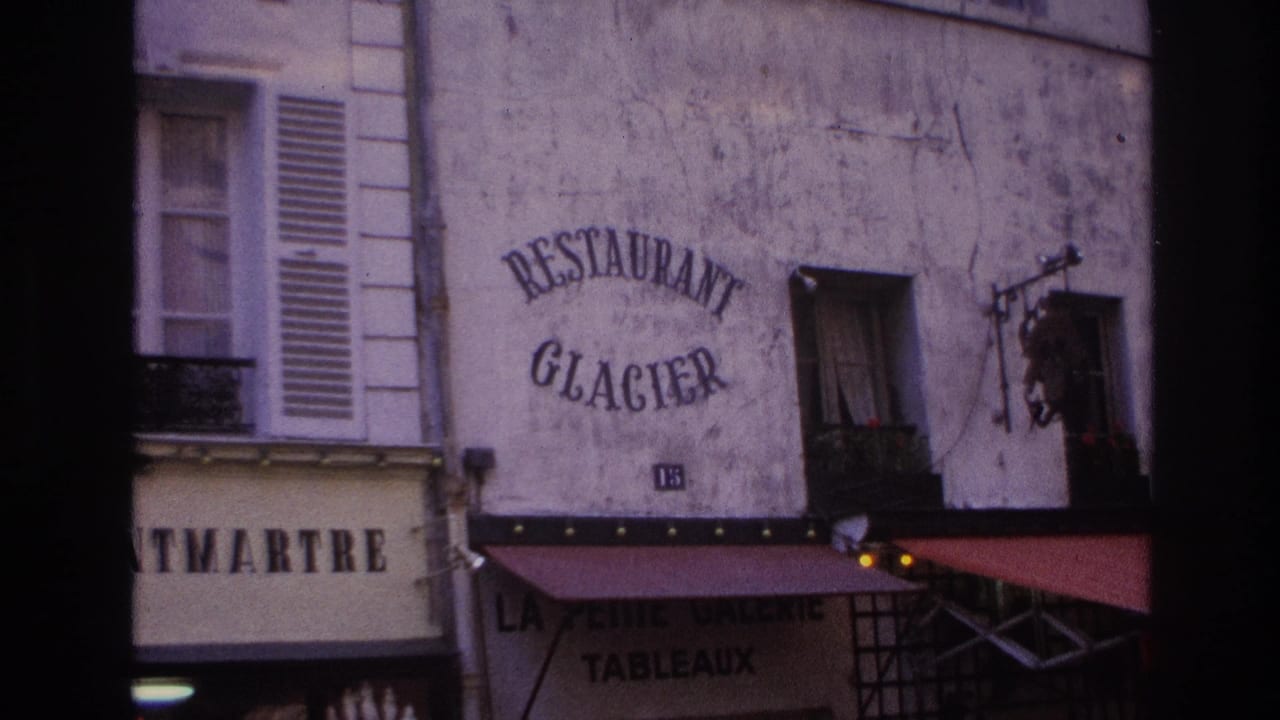 1967 Paris street view showing Restaurant Glacier signage on a weathered facade above a red awning and nearby shopfront text.