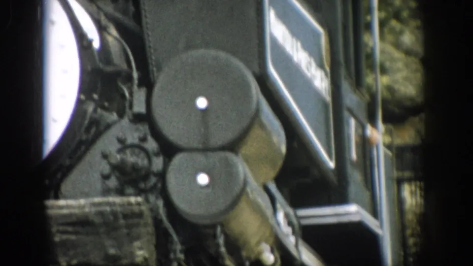 1959 Colorado train close-up showing circular locomotive components and a partial Union Pacific logo on the side panel.