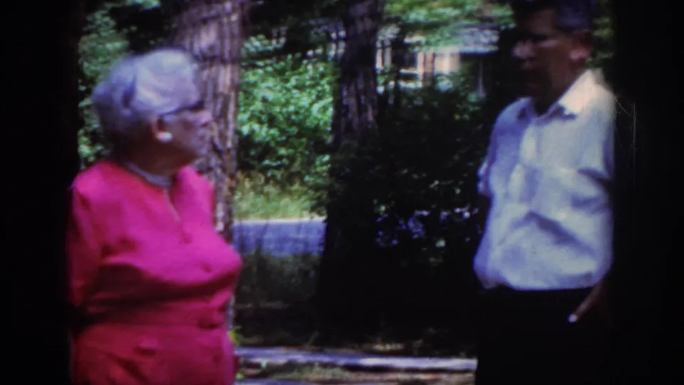 The final frame shows the 1962 Raleigh outdoor conversation continuing, with both adults framed against trees and greenery.