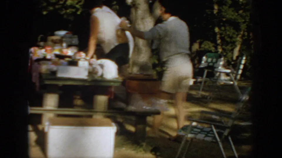 Final frame shows women beside a shaded picnic table during a 1967 Oklahoma outdoor cookout setup.