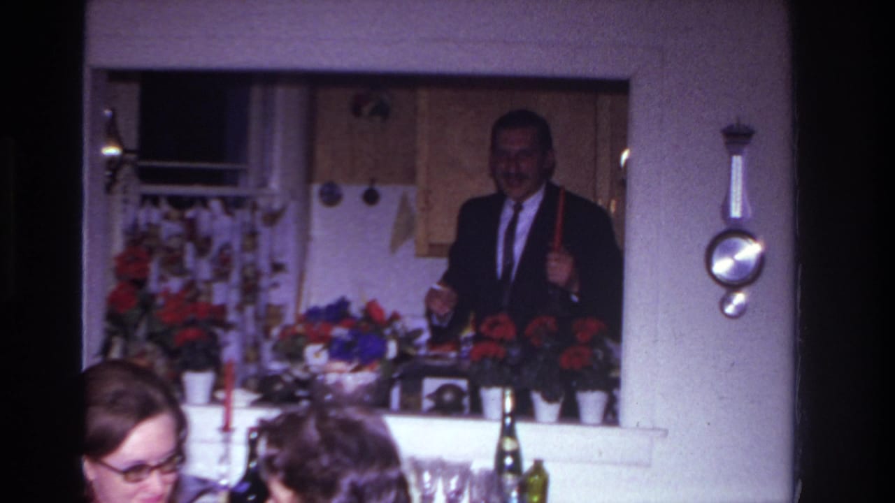 A 1967 Rockaway Beach party scene shows a suited man with a red candle in the kitchen and seated guests below the doorway.
