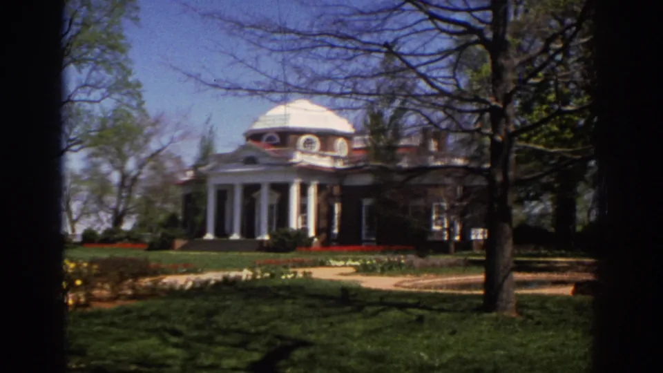 Richmond, Virginia 1971 exterior view of the columned civic building, with trees and garden paths in the foreground.