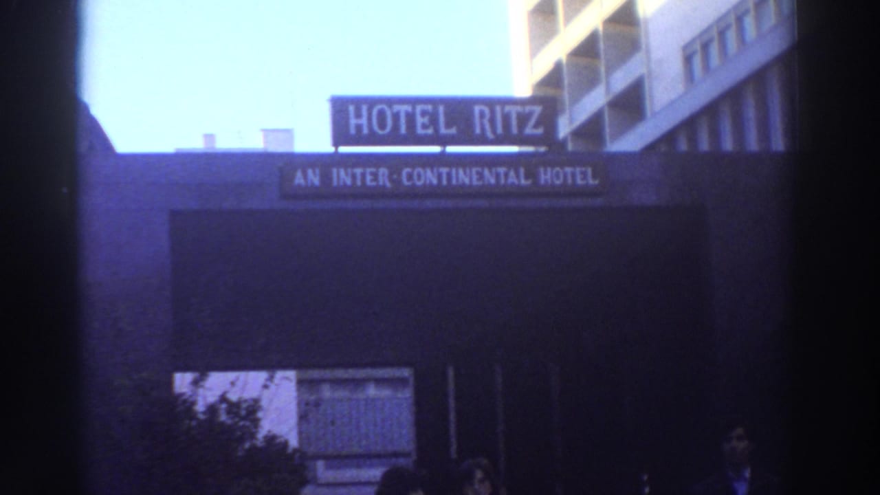 Hotel Ritz sign and hotel entrance repeated from a slightly shifted low-angle view.
