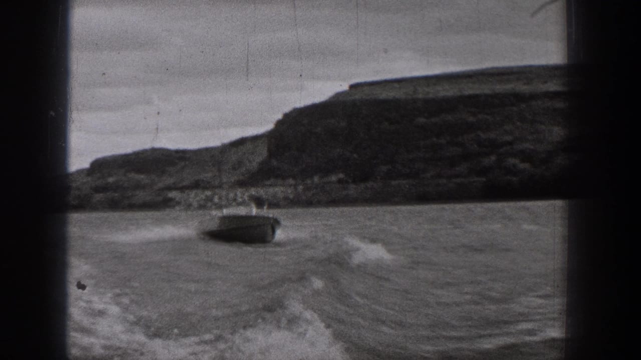 Motorboat appears ahead on the lake with a wake trailing across the water.