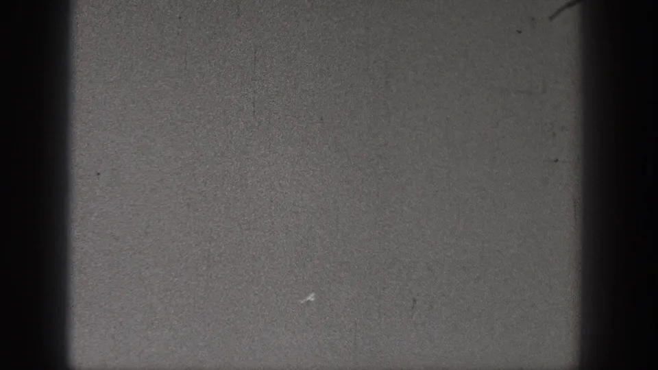 Lower contact-sheet frame from the 1938 Washington 8mm scan, showing gray film texture, dark borders, and surface wear.