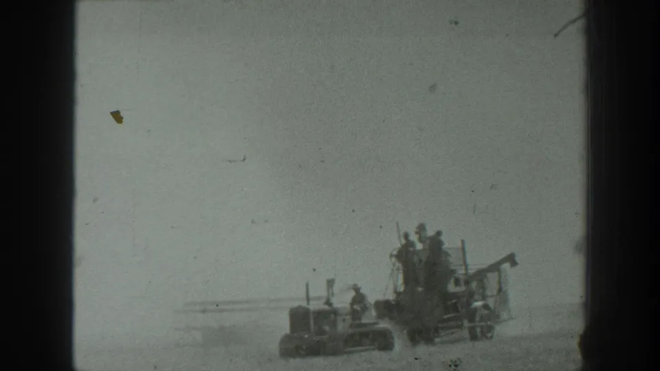 A wider 1939 California farm scene shows a tractor and towed machinery with men clustered on the implement under a pale sky.