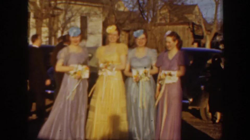 The final frame shows four women in formal pastel gowns holding bouquets near dark cars, bare trees, and a sunlit residential exterior in Montana.