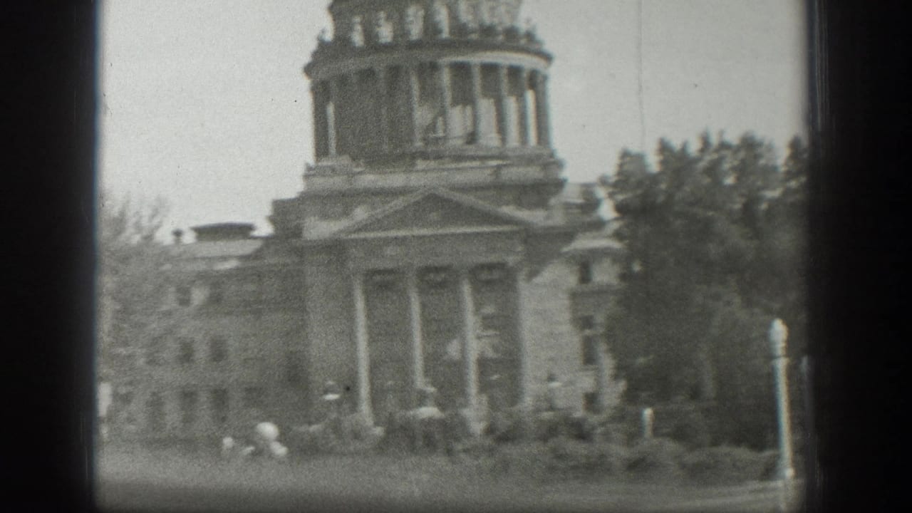 1939 Wyoming 8mm frame showing a columned domed building partly obscured by a window frame.