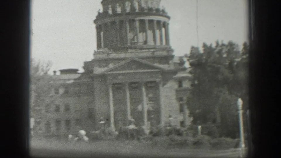 1939 Wyoming 8mm frame showing a columned domed building partly obscured by a window frame.