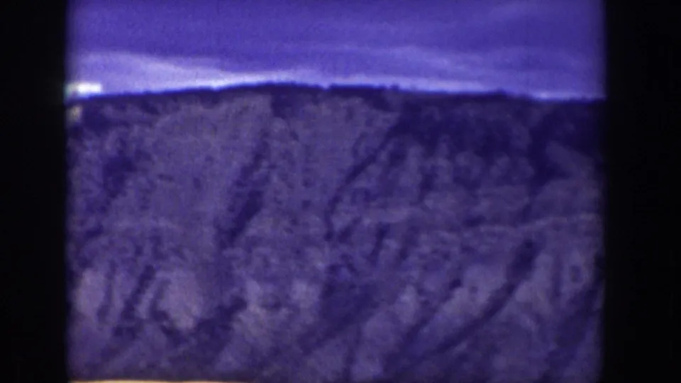 The final 1939 Wyoming frame shows a soft, purple-blue mountain slope with only faint valley detail near the lower edge.