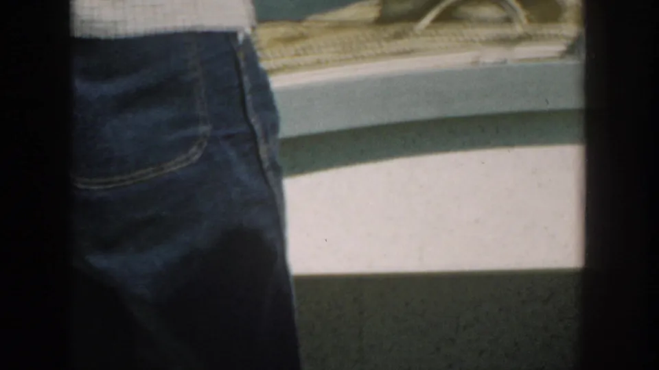 Final frame shows denim-clad legs near the boat deck, with a woven basket and light-colored boat side in view.