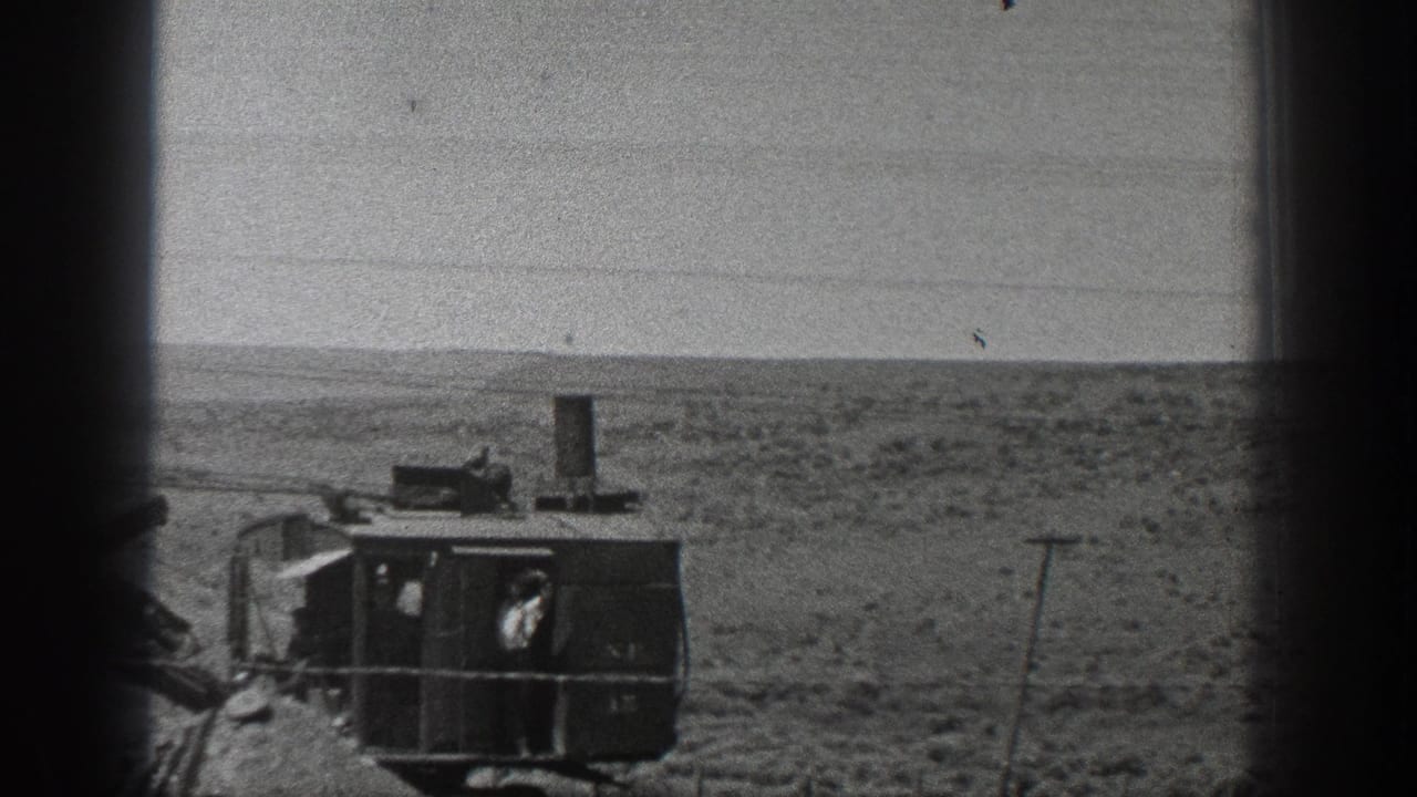 1936 California desert footage showing a steam-powered industrial machine at a distance, with an operator visible in the cab.