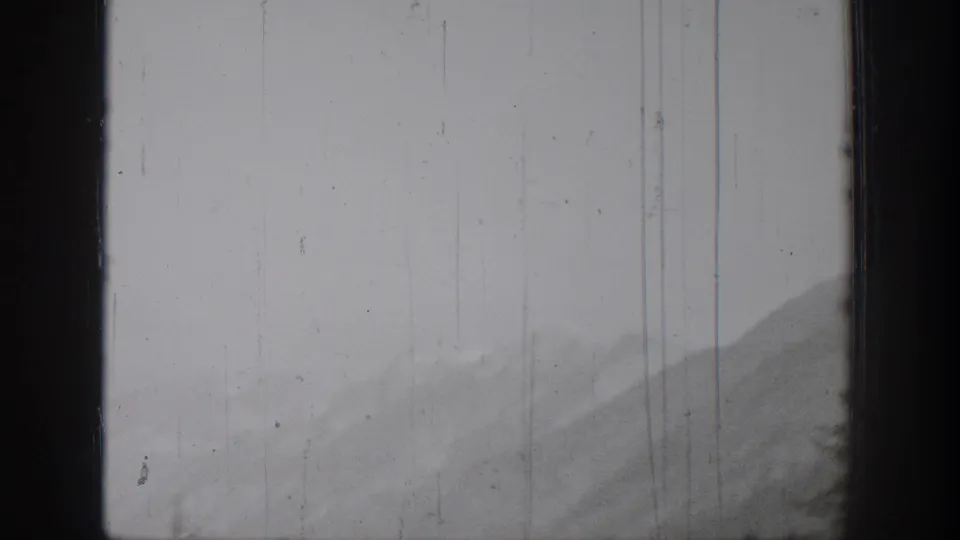 Black-and-white 1939 Chelan-area mountain view, partially obscured by a dark window or film-frame edge.