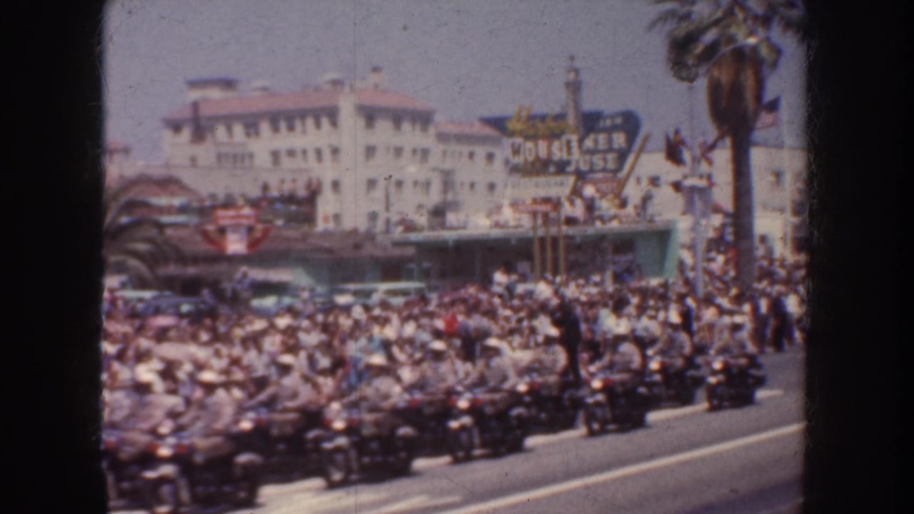 The final frame shows a dense 1952 California parade crowd, multiple motorcycles, palm trees, and a prominent commercial venue sign along the street.