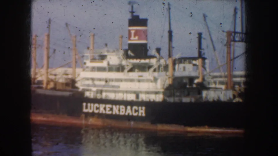 1952 California close frame of the Luckenbach cargo ship, emphasizing the named hull, white superstructure and funnel marking.