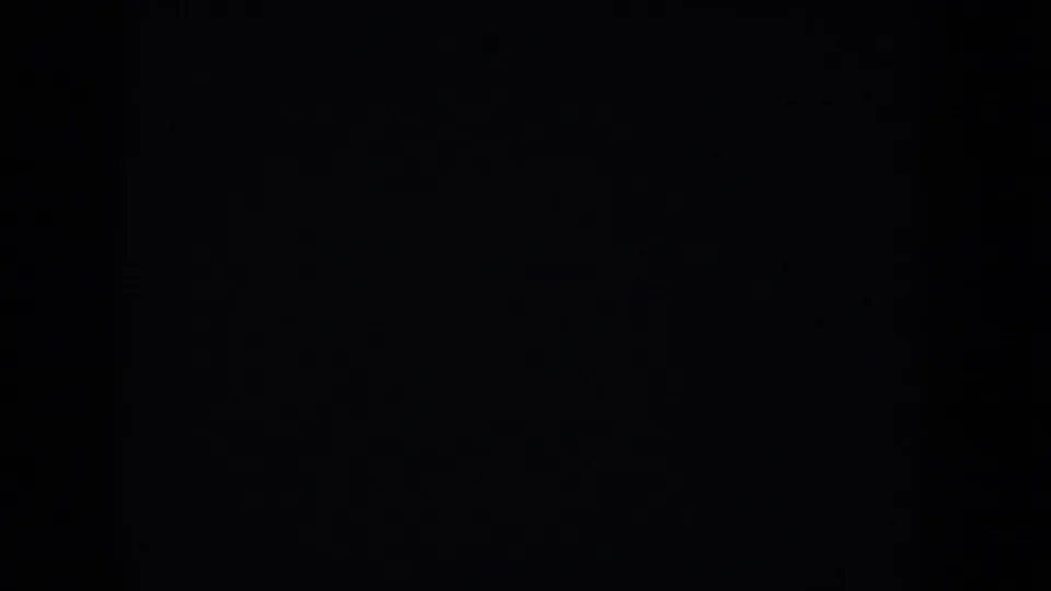 Dark frame marking the end of the 8mm clip segment; no subject matter discernible.