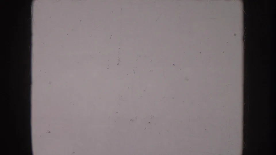 Overexposed or transition frame mid-clip; no subject or location detail discernible.
