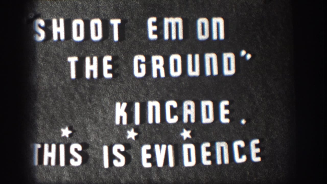 8mm title card with white block text reading SHOOT EM ON THE GROUND, KINCADE, THIS IS EVIDENCE on dark textured background