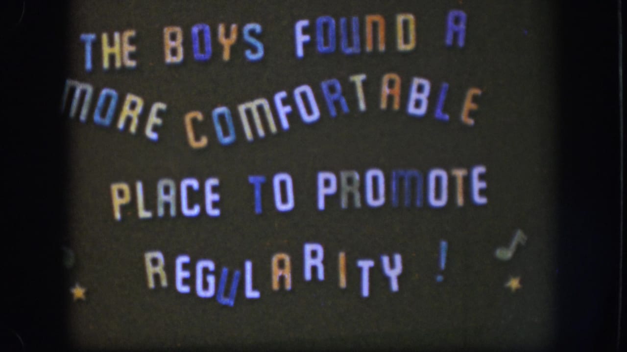 8mm home-movie title card circa 1958 with multicolored lettering; color saturation appears slightly warmer in this frame than earlier frames.