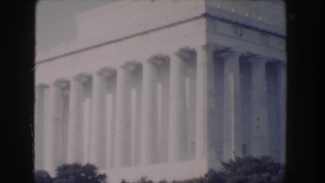 Closer angled view of the Lincoln Memorial colonnade and upper stone facade.