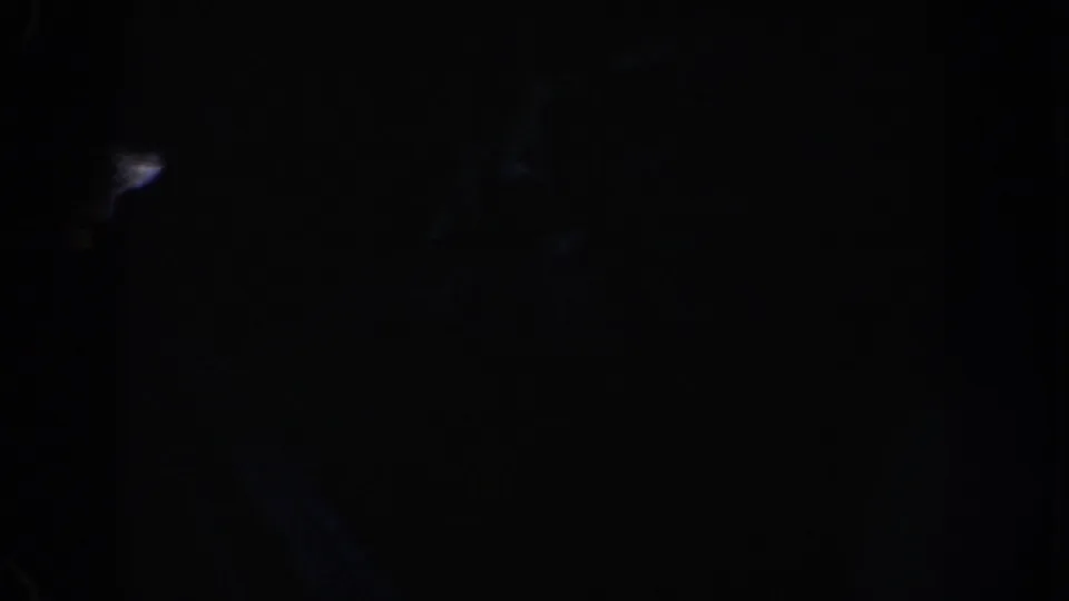 Near-black final frame from the 1962 Anaheim 8mm clip, suggesting a transition or end of exposed footage.