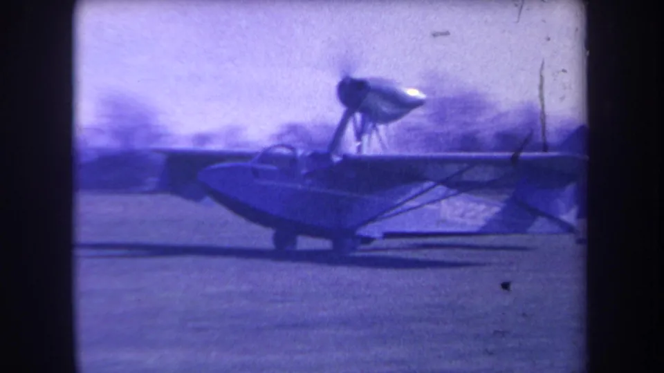 The plane appears near the end of its takeoff pass in the 1963 Volmer Yucaipa home-movie frame.