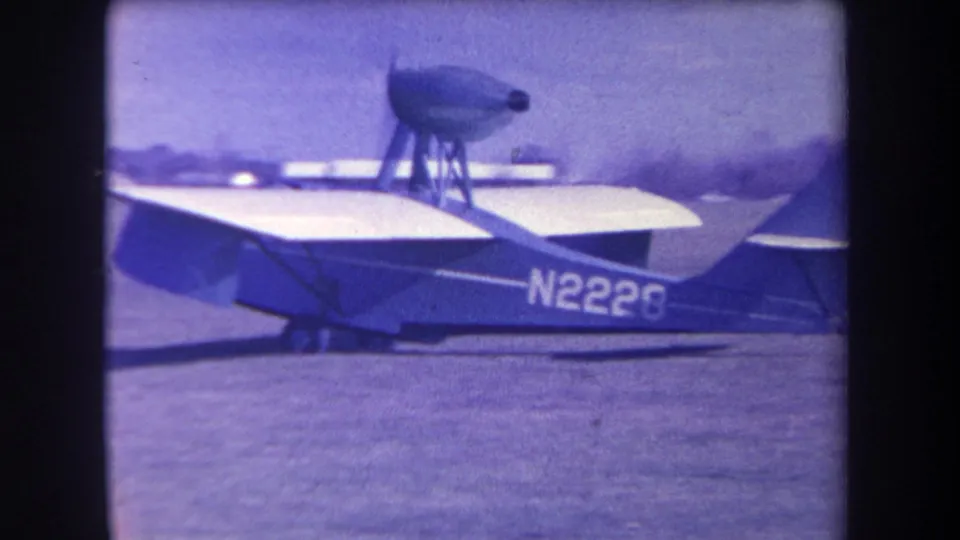Final frame shows the blue-and-white amphibious plane at Yucaipa with its high propeller mount and N2226 marking visible.