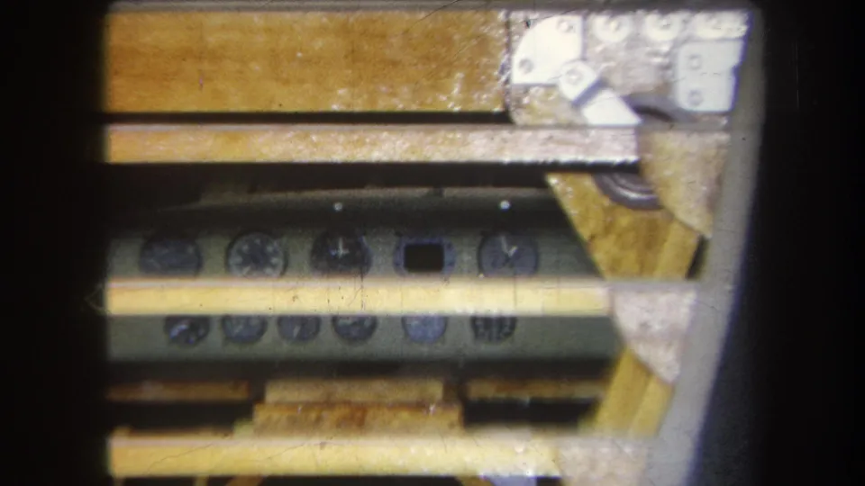 1964 Yucaipa frame showing the control device cropped at the side, with wood rails and metal hardware dominating the view.