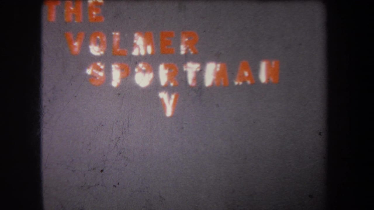 Textured wall title reads The Volmer Sportsman with a single white V below.