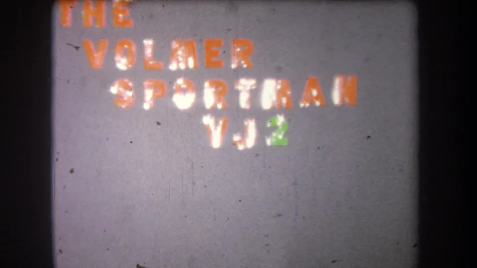 1965 8mm frame showing The Volmer Sportsman wall title with added VJ2 lettering in white and green.