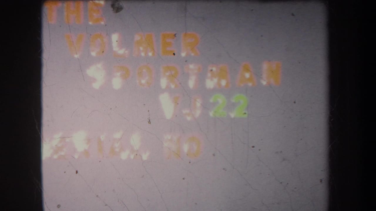 1965 Yucaipa home-movie title card reading The Volmer Sportman VJ 22, with soft focus, scratches, and dark film edges.