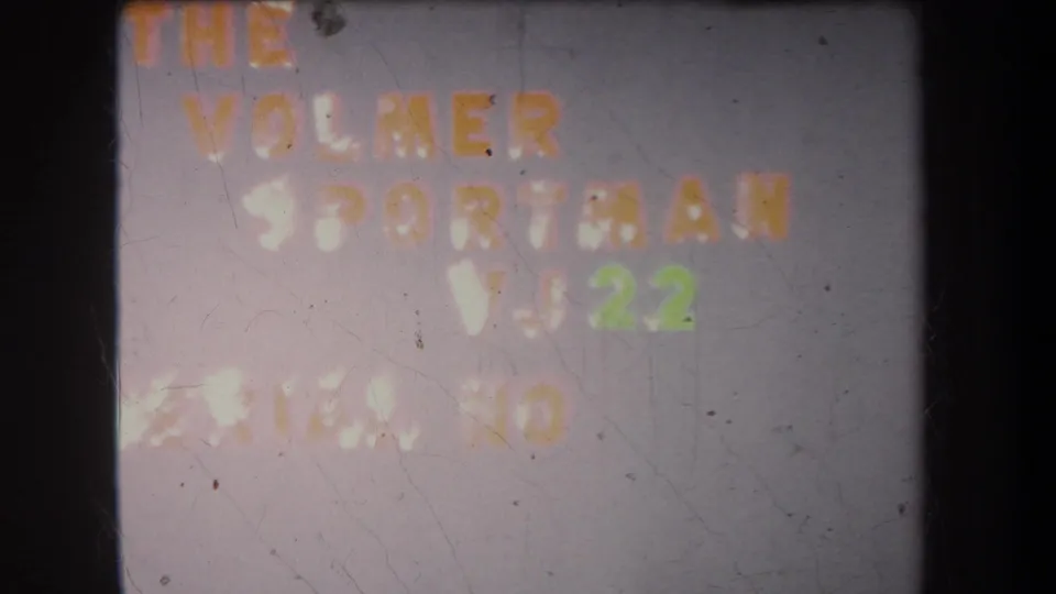 1965 Yucaipa home-movie title card reading The Volmer Sportman VJ 22, with soft focus, scratches, and dark film edges.
