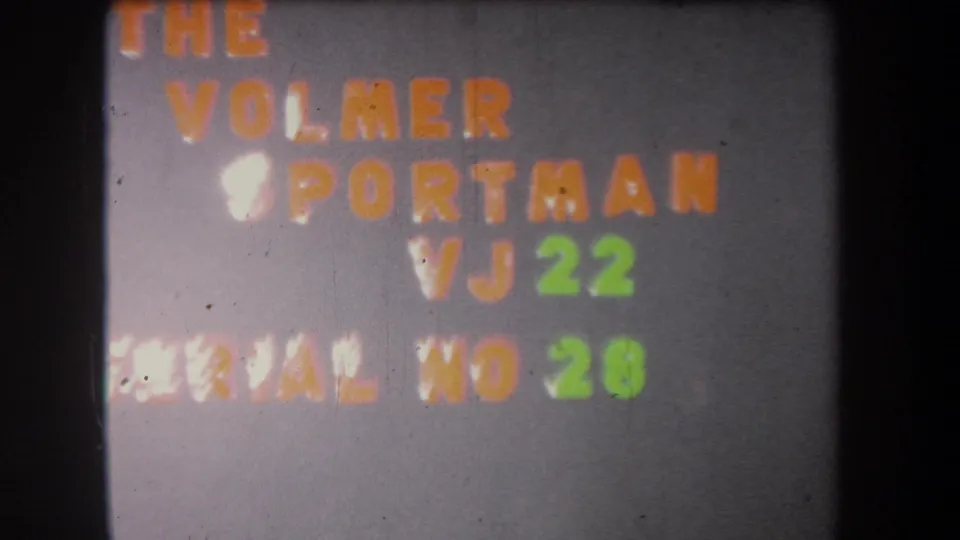 End frame of the 1965 Yucaipa title card for The Volmer Sportman VJ 22, showing serial number text and physical-film artifacts.