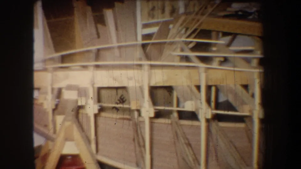 Final 1965 8mm frame appears to show nearby aircraft or hangar framework after the takeoff view.