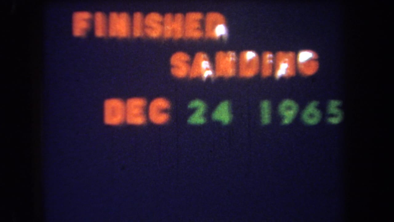 Repeated title text reads FINISHED SANDING DEC 24 1965 on a dark blue background.