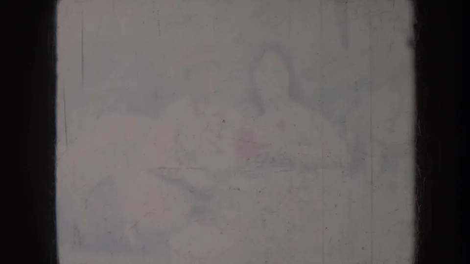1967 Honolulu 8mm frame with indistinct seated adults barely visible through heavy fading, scratches, and dark gate edges.