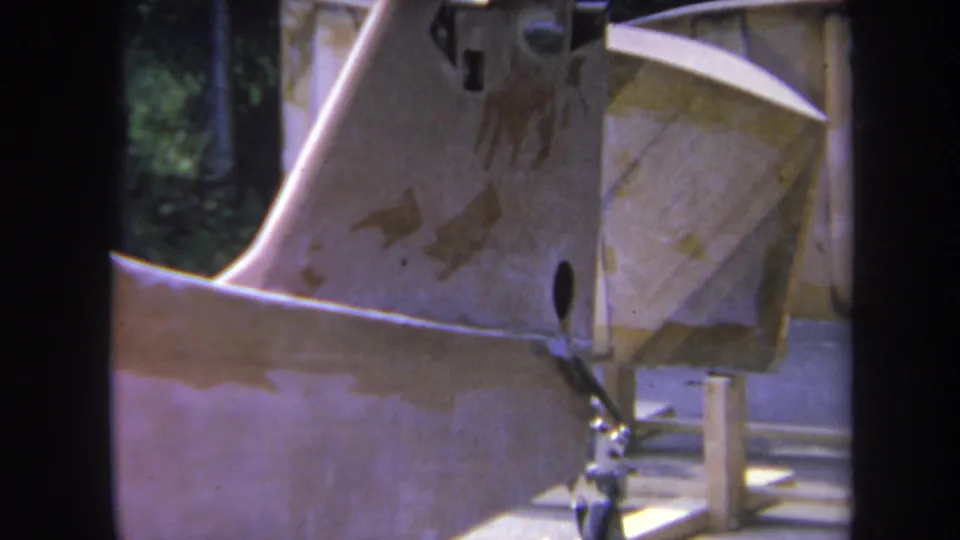 1969 Yucaipa frame showing the unfinished rear aircraft structure from a closer angle, including landing gear and wood supports.