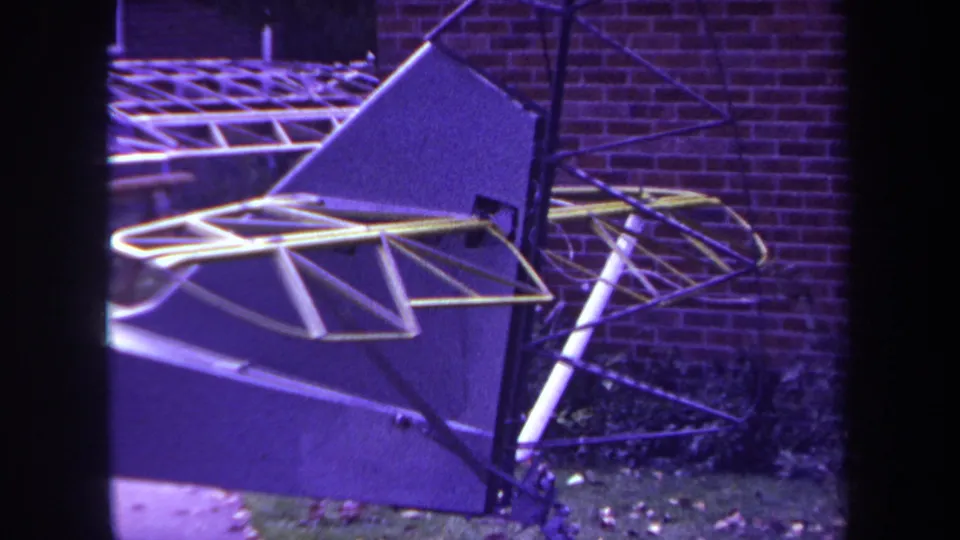 A close 1969 Yucaipa frame shows the homebuilt sailplane or aircraft structure, including yellow metal tubing and dark fabric-covered surfaces.