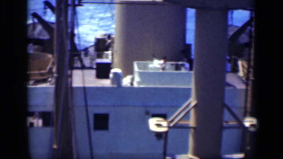 1946 Egypt reel frame with the ship's funnel dominating the view and a small person visible near the upper deck railing.
