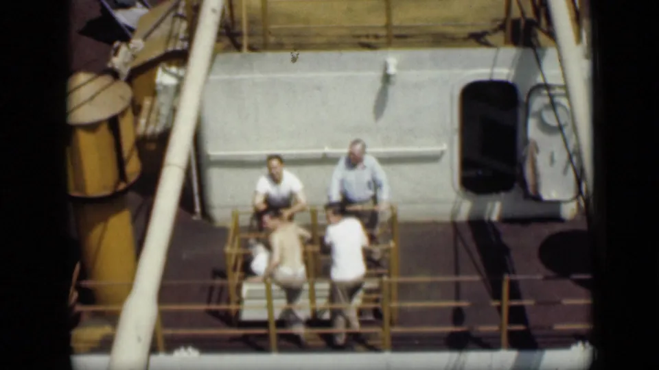 1946 Egypt 8mm footage shows several men in light clothing gathered or working on a large ship deck.