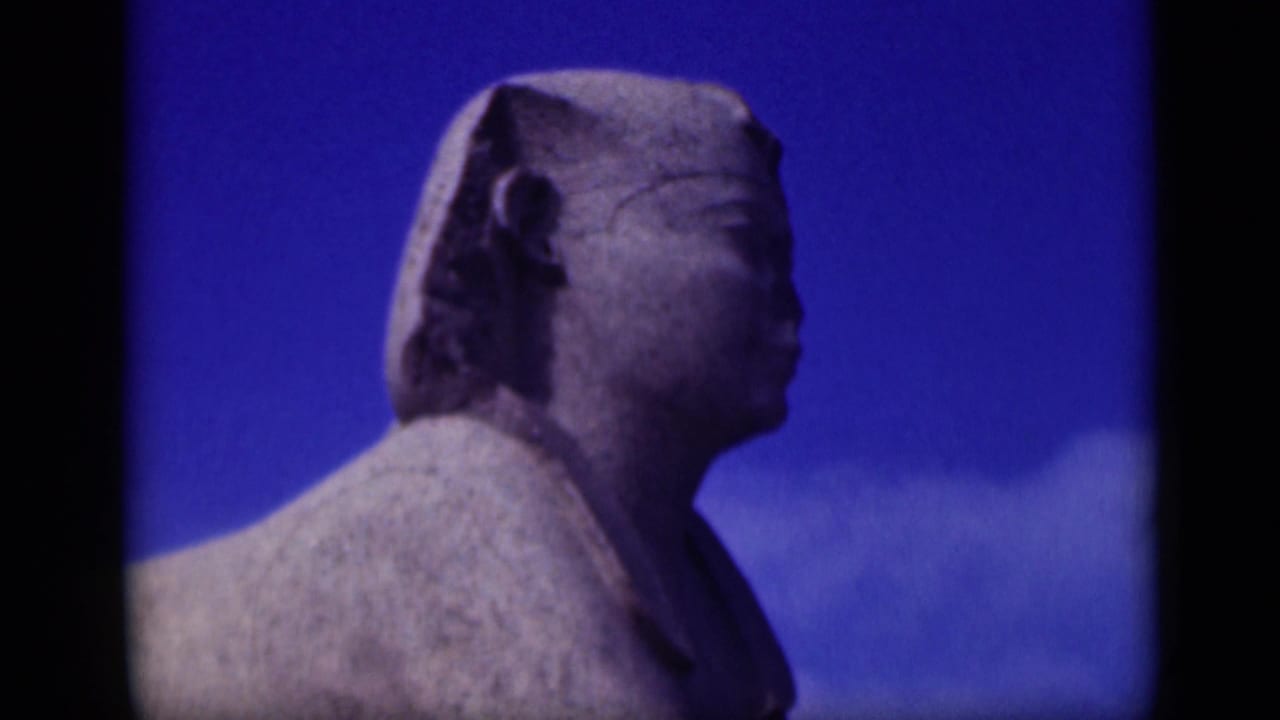 Sphinx profile repeated against blue sky and clouds.