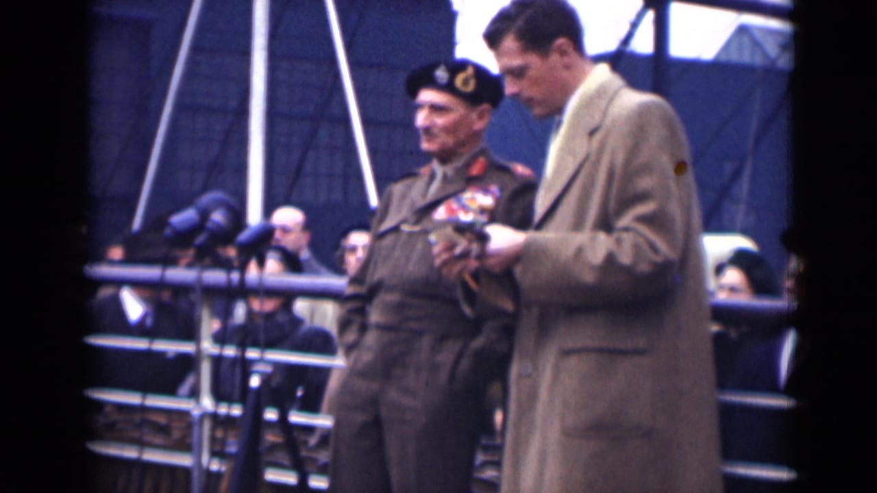 In the 1946 London ceremony, the veteran in medal ribbons faces a younger overcoated man who appears to read from a paper near microphones.