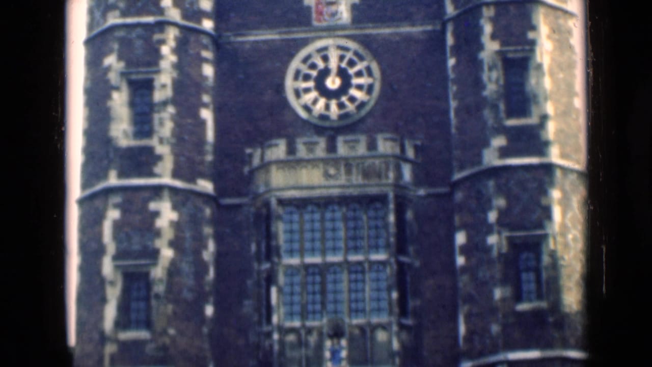 1946 London frame showing the clock face, crest area, and central window details on a Gothic-style exterior.