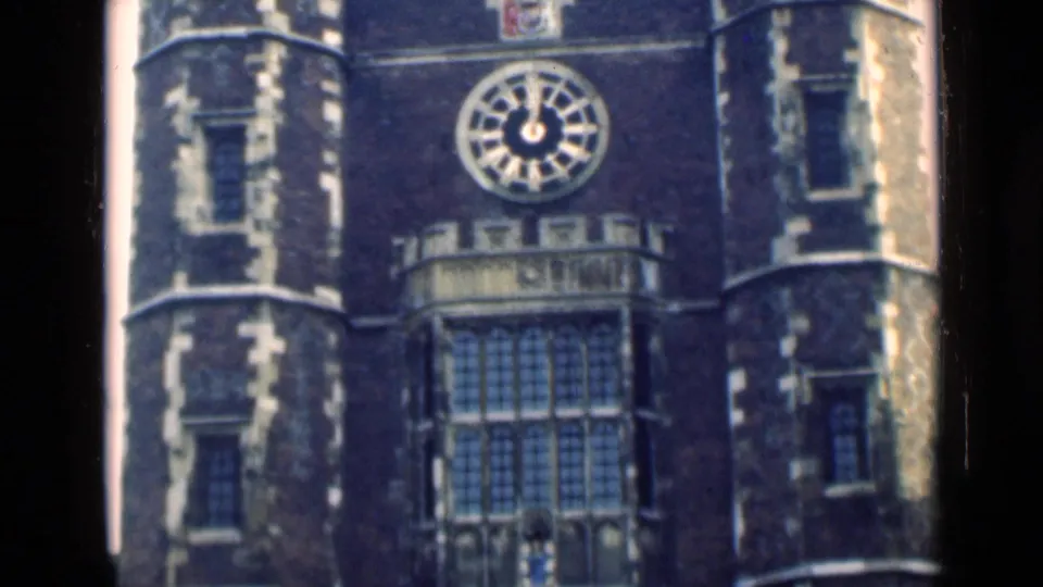 1946 London frame showing the clock face, crest area, and central window details on a Gothic-style exterior.