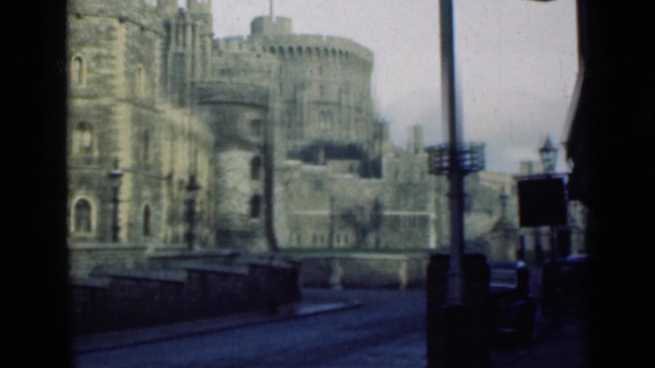 Windsor Castle appears across the street in a soft 8mm frame, with stone walls, a round tower, lamps, and muted sky.